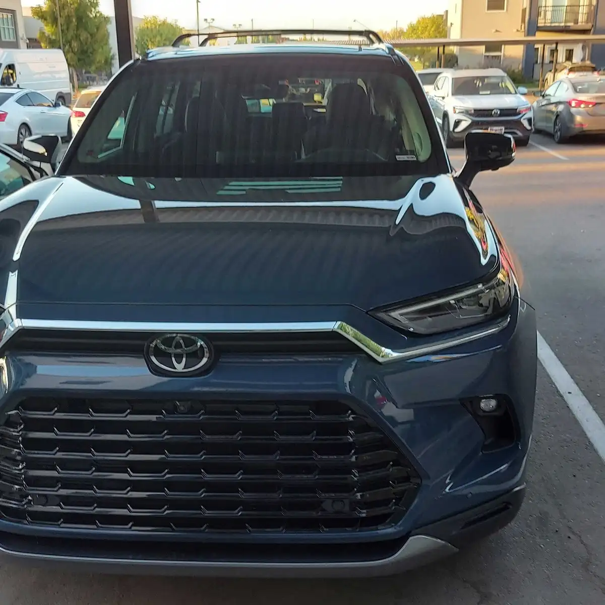 Front of the Boise Private Car, a blue-gray Toyota Grand Highlander